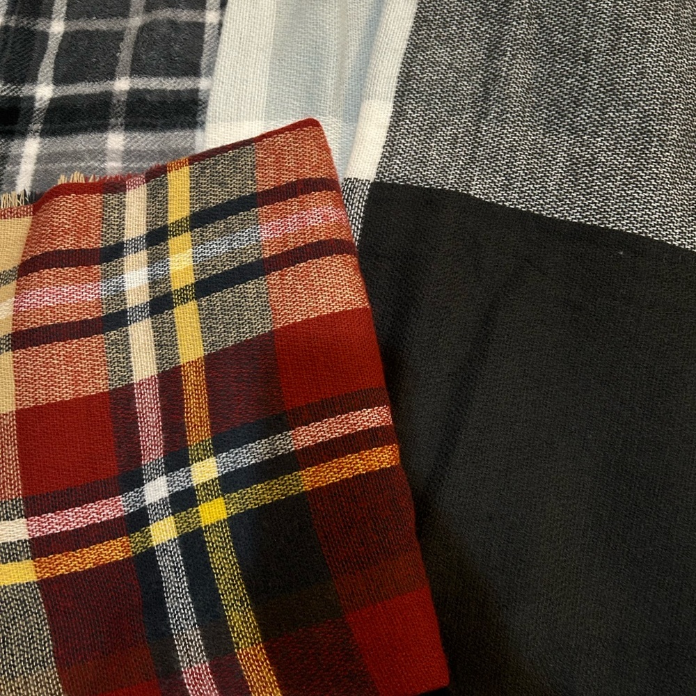 Two large blanket scarves.